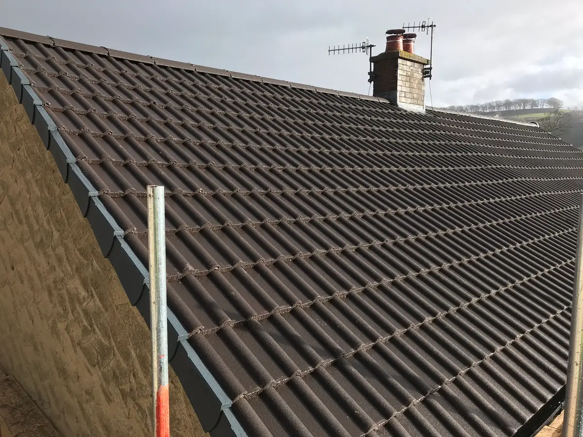 Roofers work by Broomhill Roofing near Horsforth